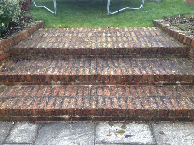 before pressure washing brick